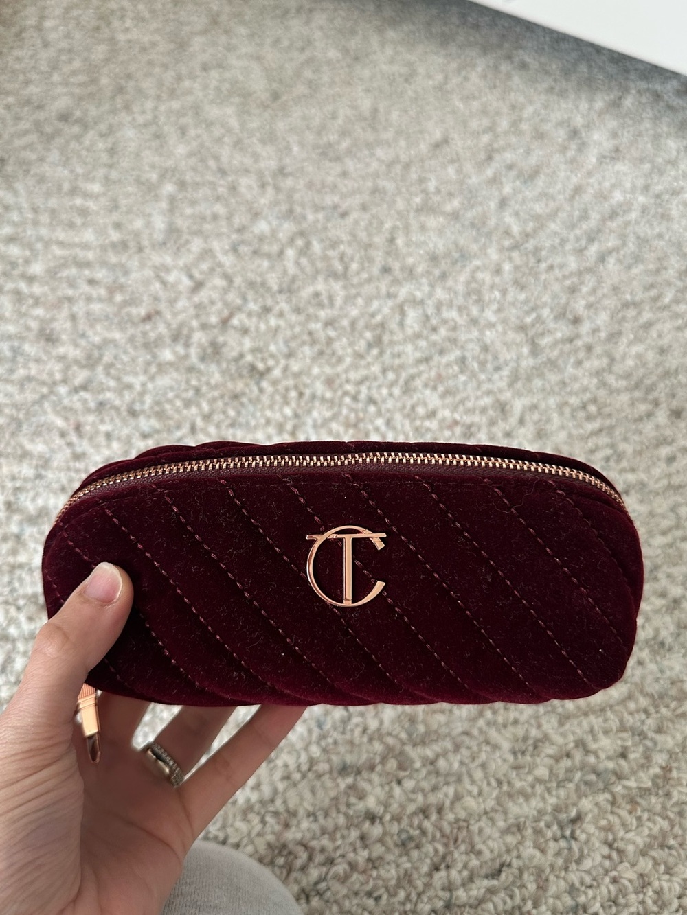 Charlotte Tilbury Quilted Velvet Cosmetic Case in Burgundy with Gold CT Logo